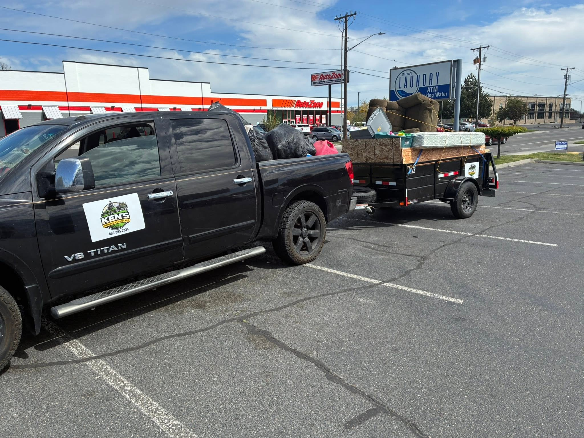 Ken's truck and trailer loaded with household junk
